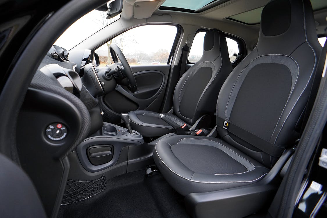 The interior of a car Description automatically generated